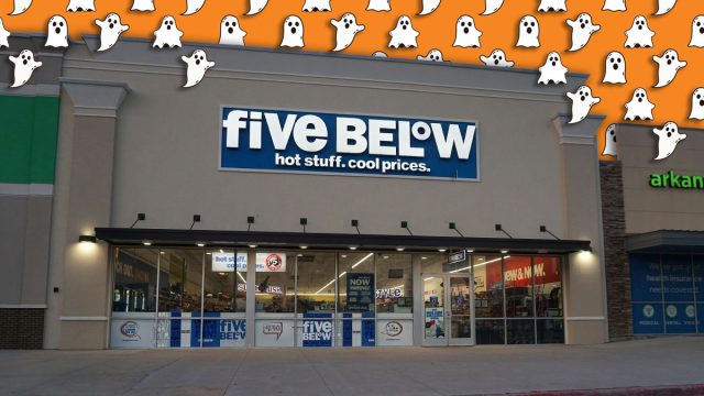 11 Best New Five Below Halloween Finds Under $5. A Five Below storefront glows under early evening light in Little Rock, Arkansas, with bold blue branding, hiring signage, and interior merchandise displays visible through large glass windows in a neighborhood shopping center. Little Rock, AR, USA April 17, 2026