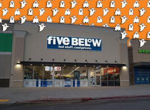 11 Best New Five Below Halloween Finds Under $5. A Five Below storefront glows under early evening light in Little Rock, Arkansas, with bold blue branding, hiring signage, and interior merchandise displays visible through large glass windows in a neighborhood shopping center. Little Rock, AR, USA April 17, 2026