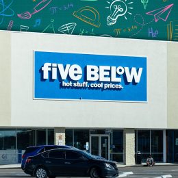 7 Best New Five Below Locker and School Finds Under $5. Jacksonville, FL - September 29th, 2024: Five Below store exterior with a blue sign and slogan "hot stuff, cool prices," featuring an empty parking lot and clear sky.