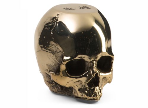 A Brass Skull Door Stop