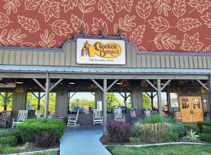 I Found 9 Cracker Barrel Fall Decor Pieces That Look Triple the Price. Pigeon Forge, TN, April 20, 2026, Cracker Barrel restaurant front entrance, exterior, company logo, old timer logo