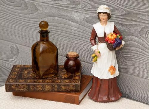 Pilgrim With Fruit Basket Figurine