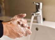 healthy man washing hands