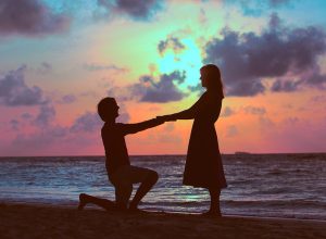 proposal tips shadow of man down on one knee proposal to woman at sunset, craziest things brides and grooms have ever done