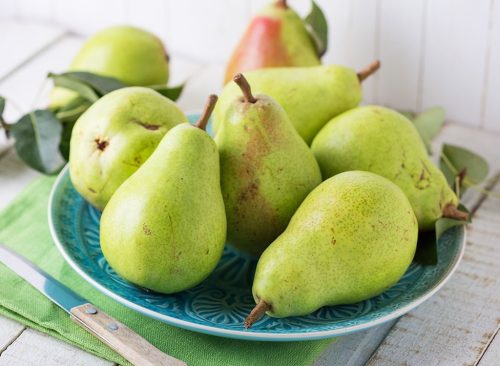 green bowl of green pears